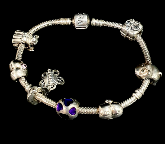 Authentic pandora bracelet with 7 charms